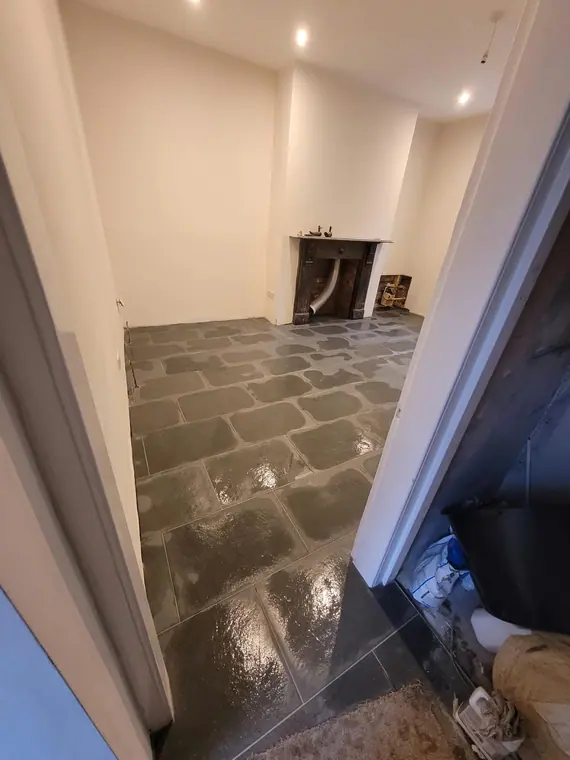 The same floor from the doorway, the sealer bringing the colour of the stone up.